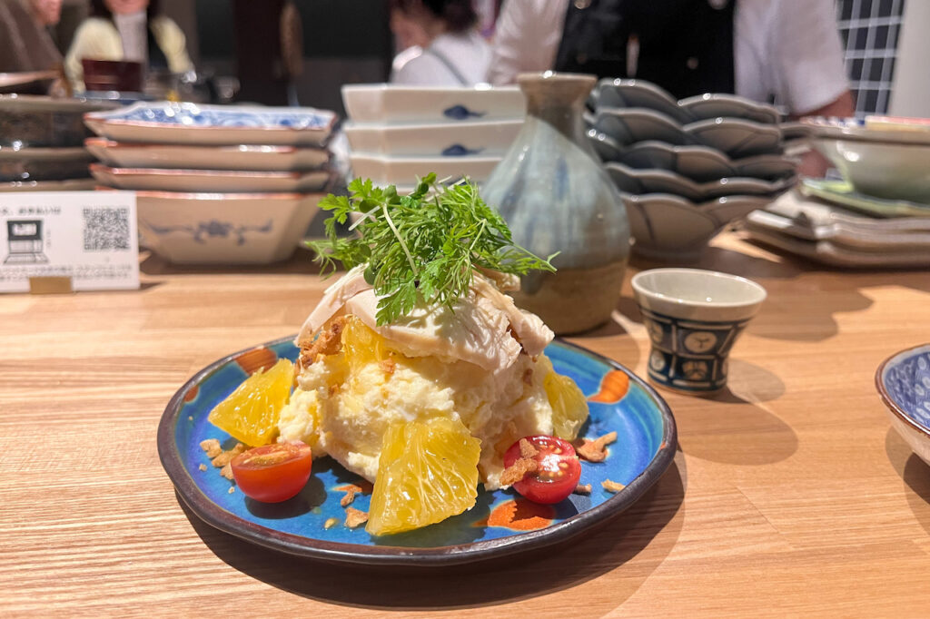 Steamed chicken with rice and sake on a moonlit night and summer tangerine potato salad